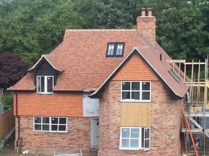 Extension tile roofing
